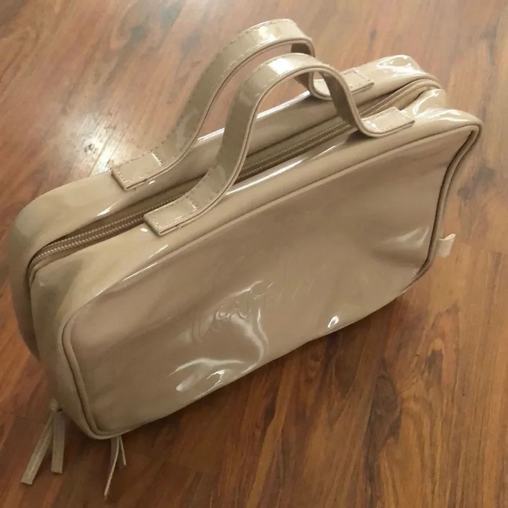 New Nude patent leather cosmetic carrying bag. “Hello Lovely” embroidered
